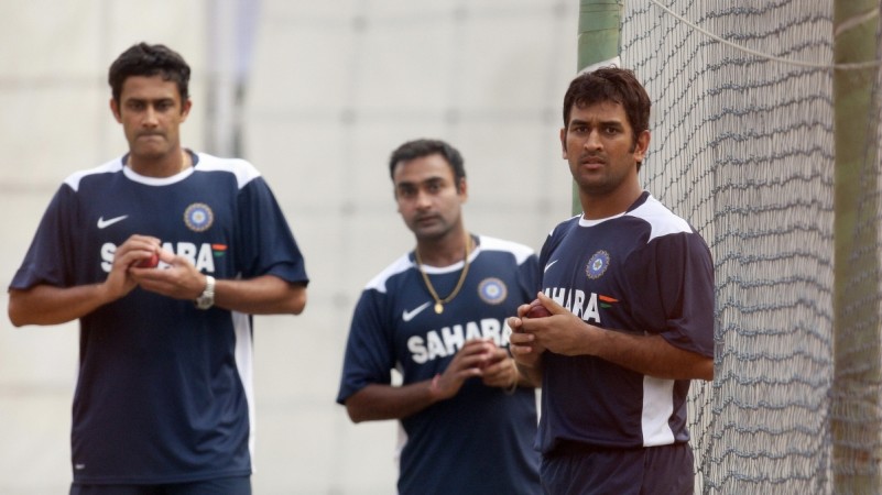Kumble (L) and Dhoni (R) with Amit Mishra in the background. MS Dhoni Anil Kumble Indian cricket team