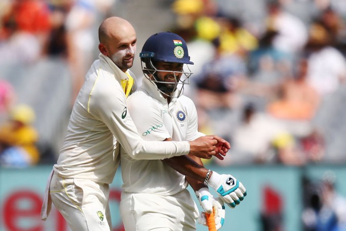 Pant and Lyon in an unlikely embrace. Nathan Lyon Rishabh Pant