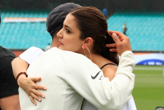 Virat Kohli embraces wife Anushka Sharma in Sydney. Virat Kohli Anushka Sharma India Cricket team
