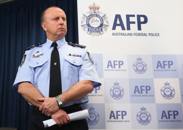 MELBOURNE, AUSTRALIA - SEPTEMBER 30: AFP Assistant Commissioner Neil Gaughan speaks to the media about the terrorism raids that took place in Melbourne this morning at Victoria Police Centre on September 30, 2014 in Melbourne, Australia. The counter terror raids were carried out in seven locations across Melbourne. Victoria Police and AFP Hold Press Conference To Discuss The Joint Counter Terrorism Raids In Melbourne