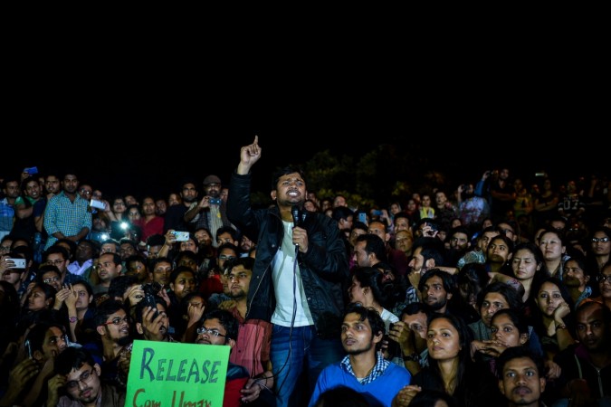 Indian student union leader Kanhaiya Kumar (C) addresses students and activists at Jawahar Lal Nehru University (JNU) in New Delhi on March 3, 2016. Indian student leader Kanhaiya Kumar walked out of prison on March 3, nearly three weeks after he was arrested on a controversial sedition charge that sparked major protests and a nationwide debate over free speech. Indian student union leader Kanhaiya Kumar