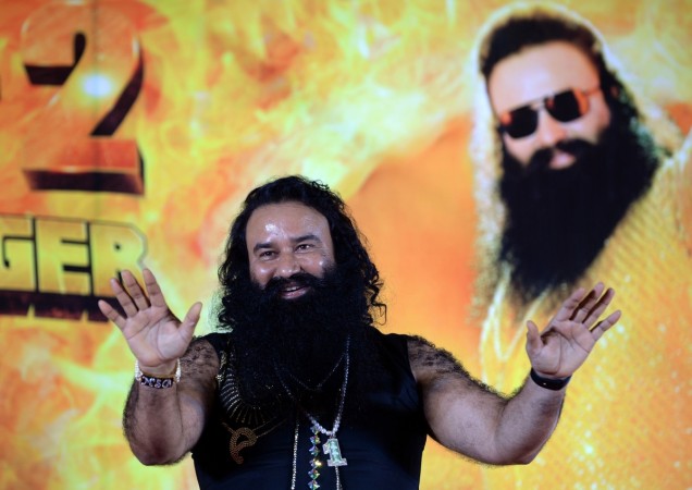 Indian chief of the religious sect Dera Sacha Sauda (DSS) Gurmeet Ram Rahim Singh gestures during a news conference to launch the score for his forthcoming film 'MSG-2 The Messenger' in Mumbai on September 8, 2015. AFP PHOTO/ PUNIT PARANJPE Indian chief of the religious sect Dera Sacha Sauda (DSS) Gurmeet Ram Rahim Singh