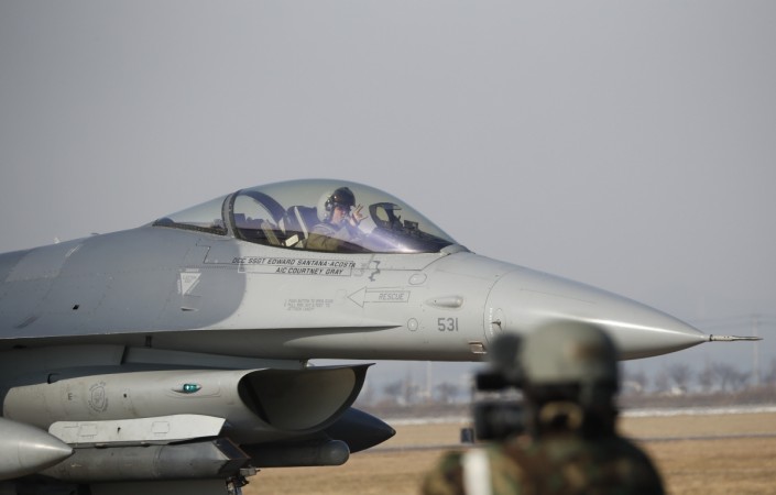 A US Air Force F-16 fighter jet takes part in a joint aerial drills called 'Vigilant Ace' between the US and South Korea at the Osan Air Base in Pyeongtaek on December 6, 2017. The US and South Korea on December 4, kicked off their largest ever joint air exercise, an operation North Korea has labelled an 'all-out provocation', days after Pyongyang fired its most powerful intercontinental ballistic missile. US F-16 aircraft