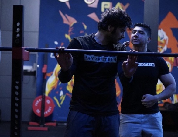 Ali Fazal with his fitness trainer Mustafa Ahmed Ali Fazal,