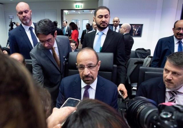 Saudi Arabia's Energy Minister Khalid al-Falih (C) speaks to journalists as he attends the 175th OPEC Conference of Organization of the Petroleum Exporting Countries (OPEC) in Vienna, Austria on December 06, 2018. - OPEC is looking for a 'sufficient' cut in oil production among its members in order to prop up plunging crude prices, Saudi Arabia's oil minister said. Saudi Arabia's Energy Minister Khalid al-Falih