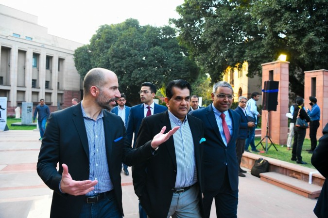 Chief Executive Officer of Uber Dara Khosrowshahi (left) and NITI Ayog Amitabh Kant (right) arrive at a conference on 'sustainable mobility' hosted by the US-India Strategic Partnership Forum in New Delhi on February 22, 2018. Khosrowshahi's suggestion to Indians not to buy cars could become controversial. NITI Aayog