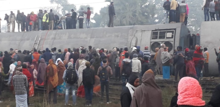 Derailed compartments of Delhi-bound Seemanchal Express seen at the accident site at Bihar's Vaishali district on Feb. 3, 2019. At least six persons were killed and 10 injured when nine coaches of the Delhi-bound Seemanchal Express derailed UP train derailment