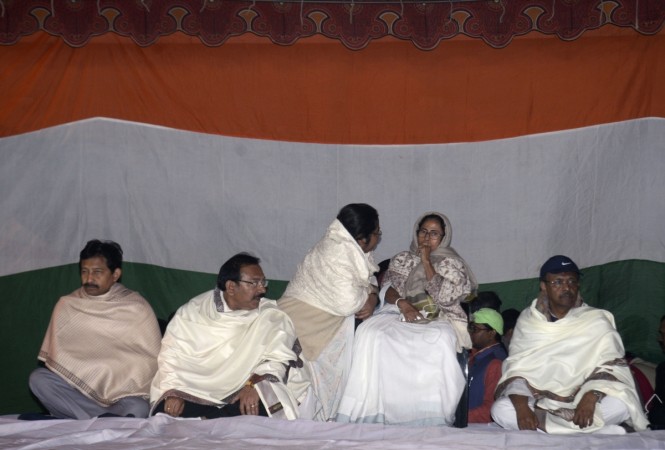 Kolkata: West Bengal Chief Minister Mamata Banerjee during a sit-in (dharna) protest against CBI raid to Kolkata Police Commissioner house at Metro Channel in Kolkata last night on Feb. 04, 2019. Mamata Banerjee vs CBI