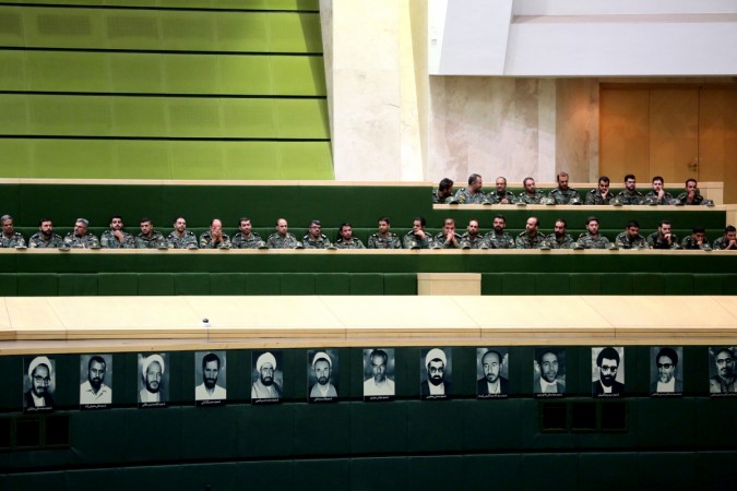Members of the Iranian Revolutionary Guard listen to a speech in parliament in Tehran on October 7, 2018, over the a bill to counter terrorist financing. - The bill, one of four put forward by the government to meet demands set by the international Financial Action Task Force (FATF), was passed by 143 votes to 120, according to the semi-official ISNA news agency. Iran at FATF