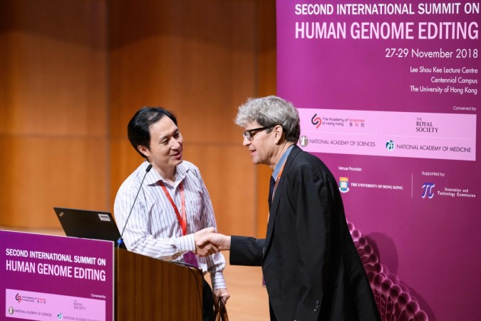 Chinese scientist He Jiankui (L) arrives to speak at the Second International Summit on Human Genome Editing in Hong Kong on November 28, 2018. (Photo by Anthony WALLACE / AFP) (Photo credit should read ANTHONY WALLACE/AFP/Getty Images) gene edited babies,