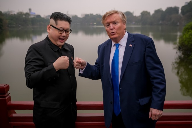 Hong Kong-based Kim Jung-Un impersonator 'Howard X', and Donald Trump lookalike 'Russell White' from Canada are seen visiting and posing for photos at Ngoc Son Temple on Hoan Kiem Lake on February 22, 2019 in Hanoi, Vietnam Trump Kim impersonators