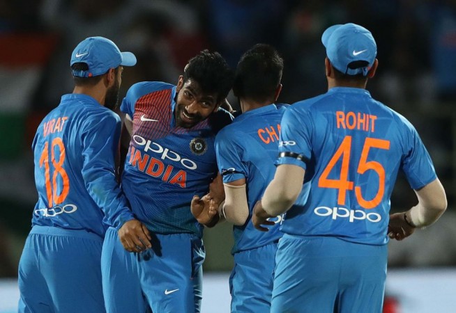 Team India celebrating the fall of a wicket. Virat Kohli Rohit Sharma Jasprit Bumrah