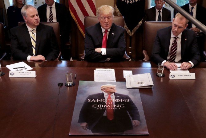 Donald Trump (C) leads a meeting of his Cabinet, including (L-R) Health and Human Services Secretary Alex Azar, acting Interior Secretary David Bernhardt, and acting Defense Secretary Patrick Shanahan, in the Cabinet Room at the White House January 02, 2019 in Washington, DC. US Donald Trump