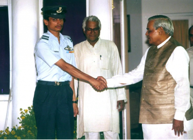 Former prime minister Atal Bihari Vajpayee shakes hands with Indian Air Force pilot Kambampati Nachiketa. Kambampati Nachiketa