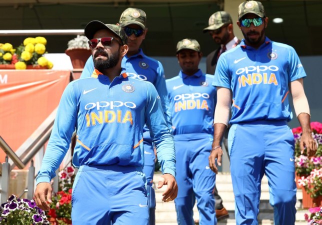 Team India sporting the special cap. Virat Kohli Jasprit Bumrah MS Dhoni