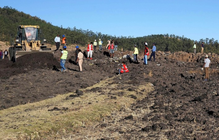 Ethiopian Airlines Nairobi-Bound Flight Crashes Killing All 157 On Board ADDIS ABABA, ETHIOPIA - Rescue and recovery personnel use an earth mover to recover debris from the area where Ethiopian Airlines Flight 302 crashed in a wheat field just outside the town of Bishoftu, 62 kilometers southeast of Addis Ababa on March 10, 2019 in Addis Ababa, Ethiopia. Rescue and recovery personnel use an earth mover to recover debris from the area where Ethiopian Airlines Flight 302 crashed in a wheat field just outside the town of Bishoftu, 62 kilometers southeast of Addis Ababa on March 10, 2019 in Addis Ababa, Ethio