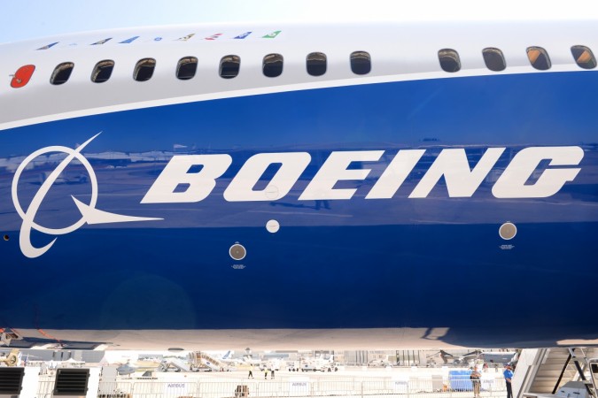 View taken of the Boeing logo on the fuselage of a Boeing 787-10 Dreamliner test plane presented on the Tarmac of Le Bourget on June 18, 2017 on the eve of the opening of the International Paris Air Show. Boeing logo