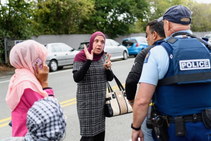 Members of the public react in front of the Masjd Al Noor Mosque as they fear for their relatives on March 15, 2019 in Christchurch, New Zealand. New Zealand mosque shooting