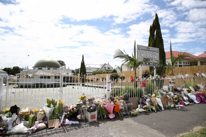 Flowers and messages of condolence are left outside the Ponsonby mosque on March 16, 2019 New Zealand shooting