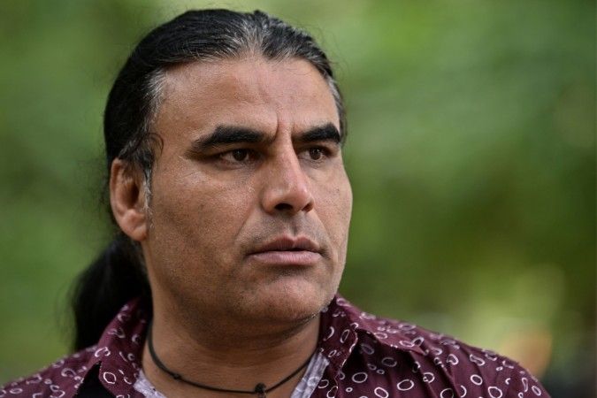 Afghan refugee and local resident Abdul Aziz looks on during an interview with AFP in Christchurch on March 17, 2019, two days after he chased a gunman during a shooting incident at the Linwood Mosque in the city Abdul Aziz