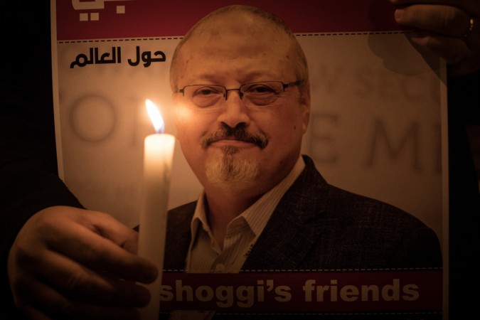 ISTANBUL, TURKEY - OCTOBER 25: People take part in a candle light vigil to remember journalist Jamal Khashoggi outside the Saudi Arabia consulate on October 25, 2018 in Istanbul, Turkey. Jamal Khashoggi, a U.S. resident and critic of the Saudi regime, went missing after entering the Saudi Arabian consulate in Istanbul on October 2. More than two weeks later Riyadh announced he had been killed accidentally during an altercation with Saudi consulate officials, however as investigations continue new information surfaced, pointing to a brutal and planned murder contradicting previous claims. Vigil for Khashoggi at Saudi Consulate in Istanbul