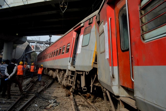 The derailed coaches of the New Delhi-bound Poorva Express at Liluah station on Dec 14, 2014. Twelve coaches of the train were derailed soon after departing from Howrah station, no injuries were reported. kanpur train derail
