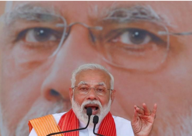 Prime Minister Narendra Modi addresses his supporters during an election campaign rally in Patan, Gujarat on April 21. Narendra Modi