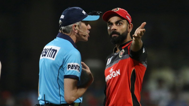 Llong and Kohli engaged in a heated discussion Nigel Llong