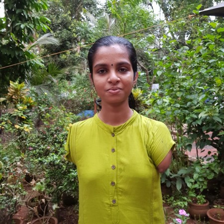 Born without hands, Devika faced life as a challenge to come out successfully clearing her SSLC exams with A . Devika
