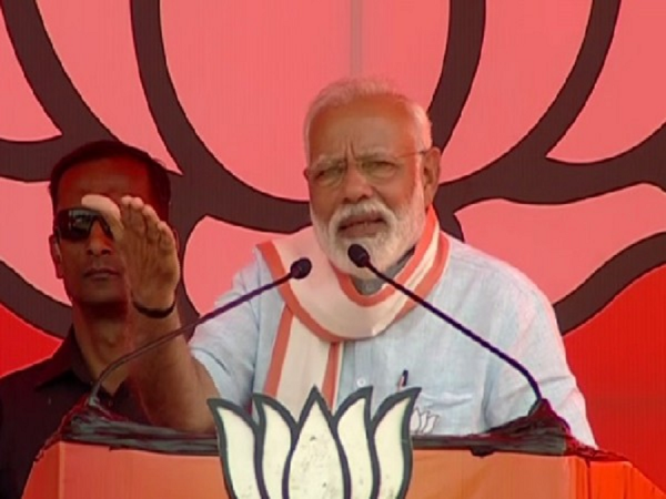 Prime Minister Narendra Modi addressing a public rally in Delhi's Ramlila Maidan. Narendra Modi