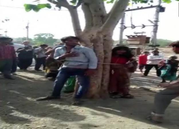 Madhya pradesh man tied to a tree