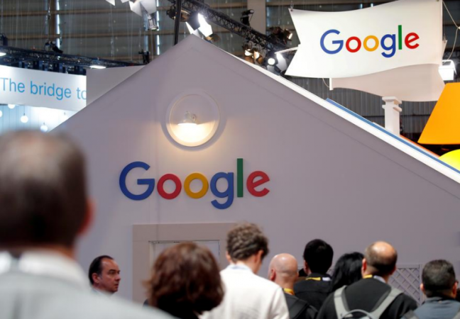 Visitors pass by the logo of Google at the high profile startups and high tech leaders gathering, Viva Tech,in Paris, France May 16, 2019. google