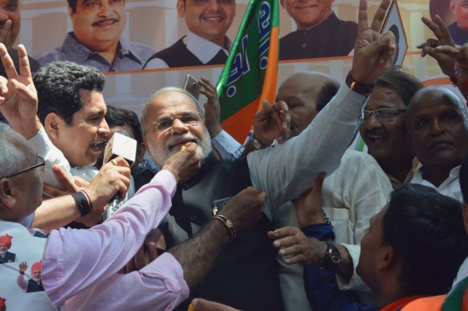Mumbai: A look alike of Prime Minister Narendra Modi celebrates BJP's performance in the recently concluded 2019 Lok Sabha polls in Mumbai on May 23, 2019. Narendra Modi