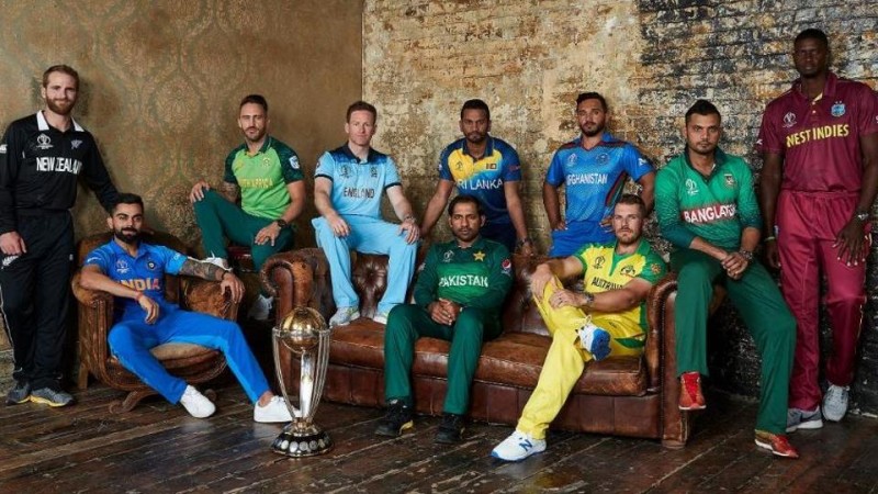 Captains pose with the ICC Cricket World Cup Captains pose with the trophy ahead of the ICC World Cup