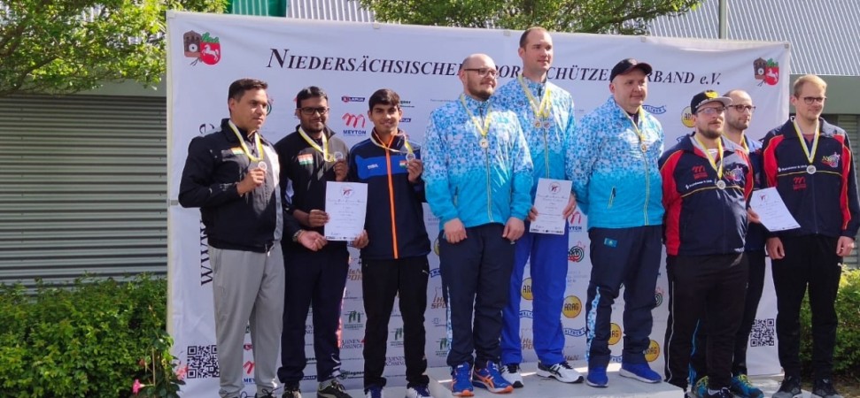 Rakshit, with his teammates, on the left of the podium Rakshit Shastry