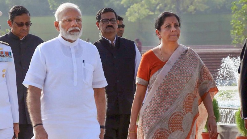 New Finance Minister Nirmala Sitharaman with Prime Minister Narendra Modi. Corporate tax
