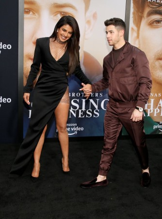 Priyanka Chopra and Nick Jonas on the Chasing Happiness premiere red carpet. Priyanka Chopra and Nick Jonas on the Chasing Happiness premiere red carpet