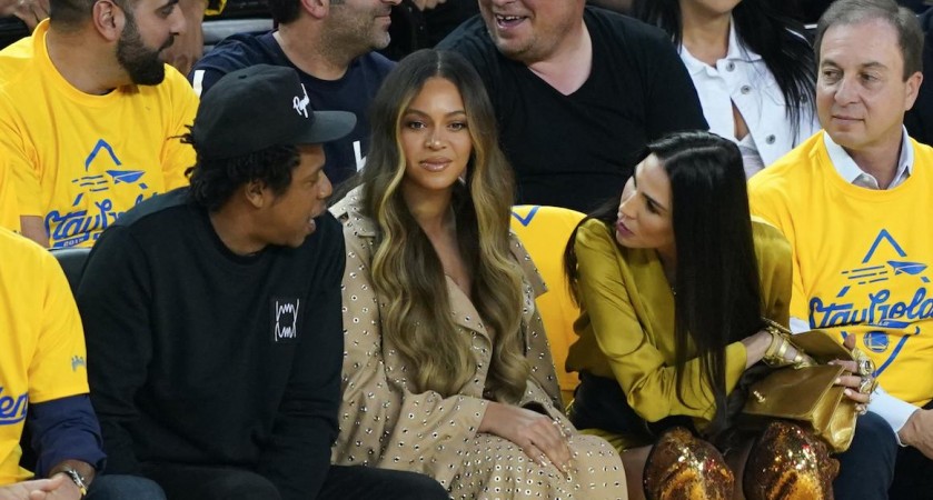 Beyonce and Jay Z with Nicole Curran at the NBA Finals