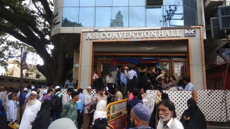 People gathered in front of AS Convention Hall in Shivajinagar, Bengaluru to file a complaint against IMA Ponzi scheme IMA scam