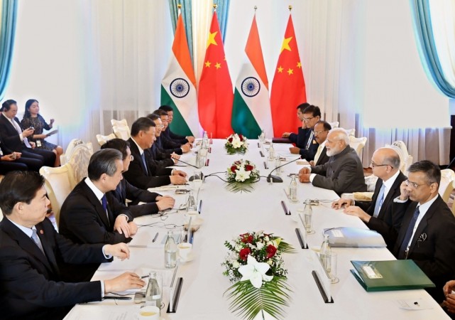 Prime Minister Narendra Modi and Chinese President Xi Jinping during a meeting on the sidelines of the SCO Summit in Bishkek, Kyrgyz Republic on June 13, 2019. SCO Meeting