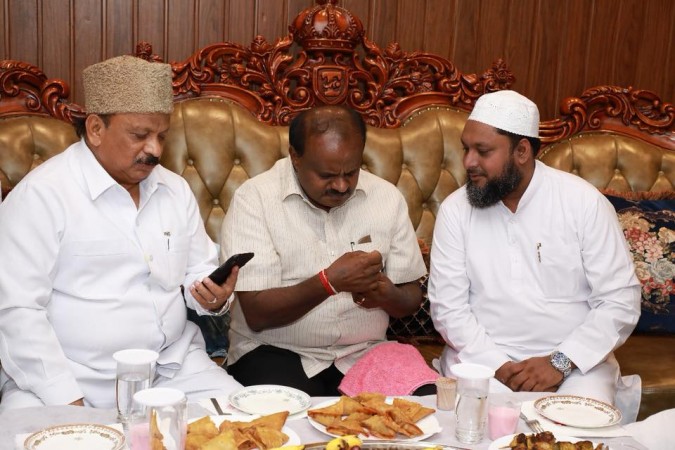 IMA director Mohammed Mansoor Khan with Shivajinagar MLA R Roshan Baig and Karnataka CM HD Kumaraswamy IMA director Mohammed Mansoor Khan with Shivajinagar MLA R Roshan Baig and Karnataka CM HD Kumaraswamy