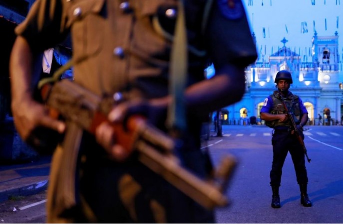 Security personnel stand guard in front of St Anthony's Shrine, days after a string of suicide bomb attacks across the island on Easter Sunday, in Colombo, Sri Lanka, April 29, 2019. easter attack