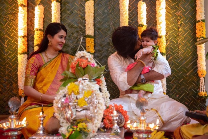 A picture of Yash and Radhika Pandit's daughter Ayra's naming ceremony. Yash-Radhika Pandit Daughter Ayra Naming Ceremony