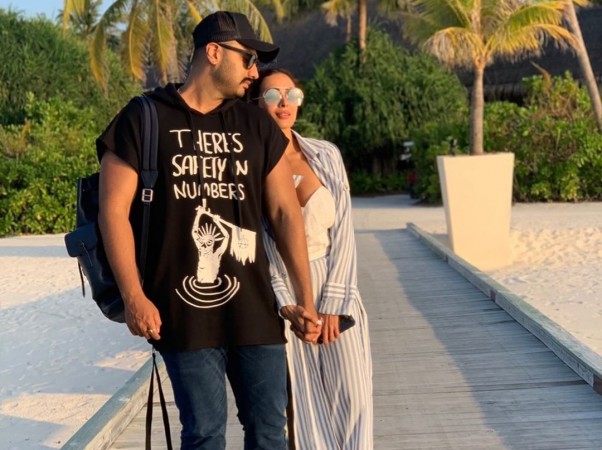   Arjun Kapoor, Malaika Arora "title =" Arjun Kapoor, Malaika Arora "width =" 660 "height =" auto "tw =" 1080 "th =" 807 "/> 

<figcaption clbad=