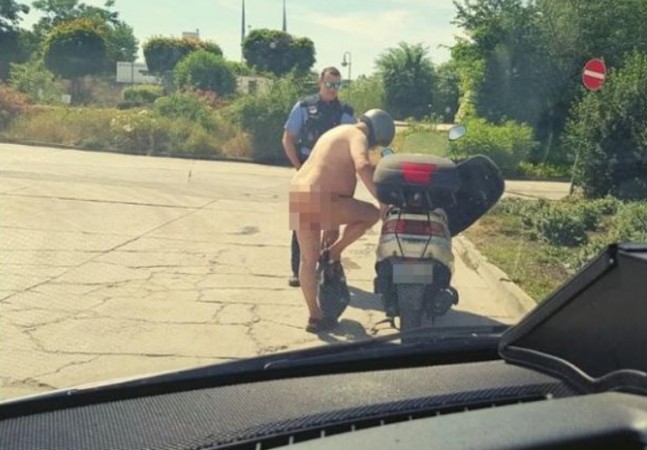 Nude scooter rider