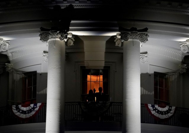 President Donald Trump and first lady Melania Trump wave from the Truman Balcony during Fourth of July celebrations in 2018 July fourth celebrations