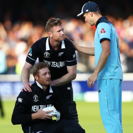 Chris Woakes commiserates with Martin Guptill Martin Guptill