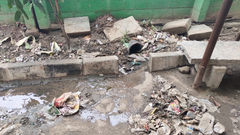 Waste accumulated inside the compound of Medahalli government higher primary school. Government higher primary school in Medahalli