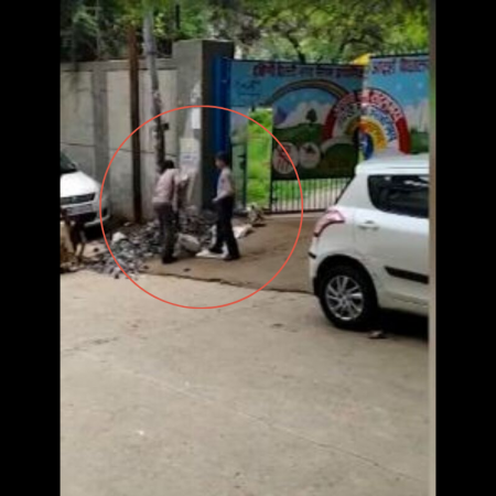 students clearing garbage