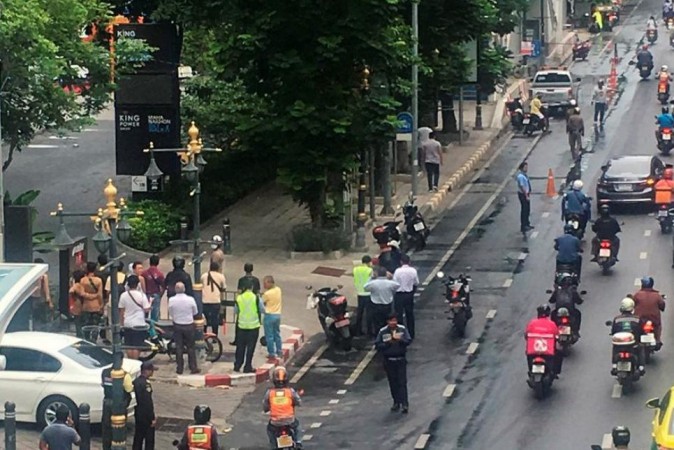A crowd gathers near the site where explosions were heard in Bangkok on August 2, 2019. bangkok blasts